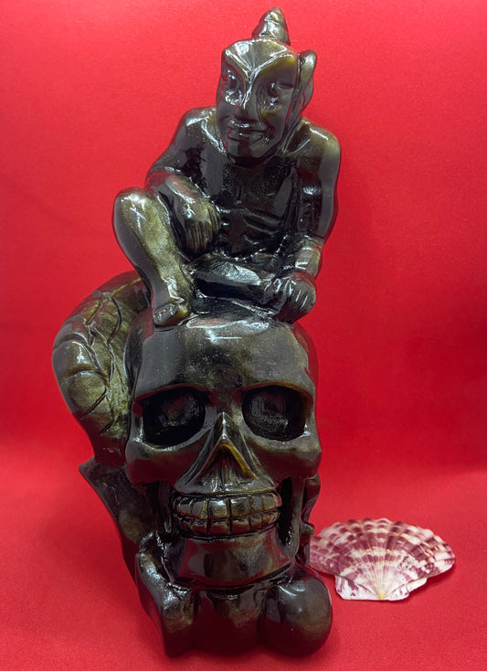 1.14kg Gold Obsidian Devil sitting on the Skull